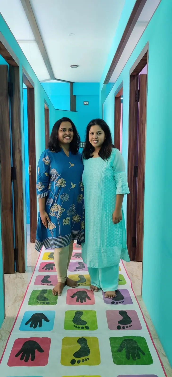 The colourful corridor at Turtle Express with a hopscotch floor